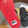 CHRISTIAN LOUBOUTIN SPIKE FLIP FLOPS